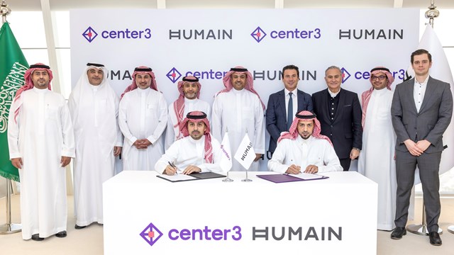 Humain and center3 representatives, including Humain's CEO Tareq Amin (sixth from the left, top row) witness the signing of the connectivity framework agreement.