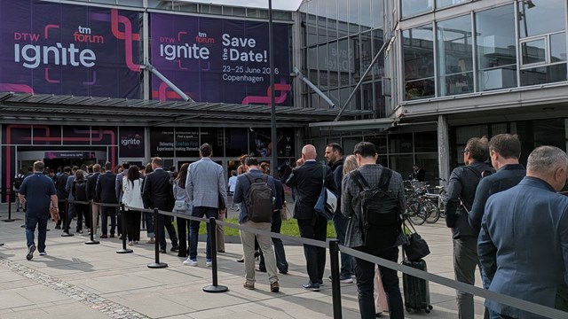 Punters queue up to get into the first morning of the TM Forum's DTW Ignite 2025 event.