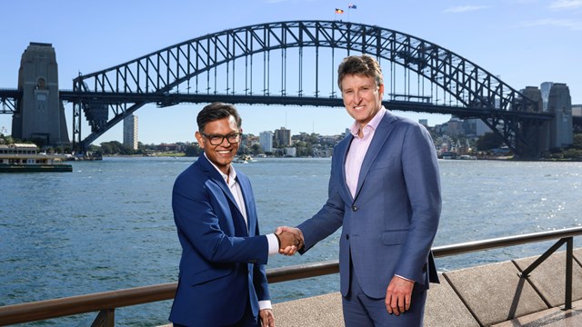 Bikash Koley, VP of Global Infrastructure at Google (left) and Steven Worrall, CEO at Telstra Digital Infrastructure, seal the deal. 