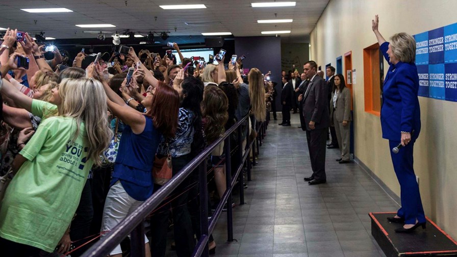 Selfie Queen Hillary Clinton on the campaign trail and unphased by mass backward snapping 