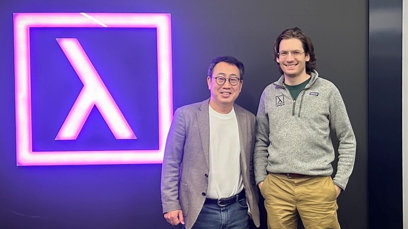 Ryu Young-sang, CEO of SK Telecom (left) and Stephen Balaban, CEO and co-founder of Lambda, pose for a photo after discussing cooperation plans at Lambda's San Jose HQ in January 2024.