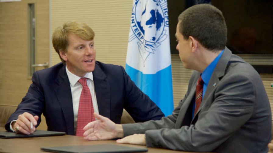 BT’s Mark Hughes (left) and Interpol’s Silvino Schlickmann © Interpol