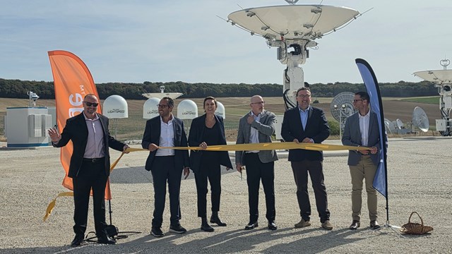 Telesat's Glenn Katz (fourth from the left) joins Orange's Jean-Louis Le Roux (second from the right) and colleagues to cut the Lightspeed gateway inauguration ribbon at the Bercenay-en-Othe site. 