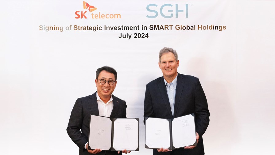 Sign of the times... SK Telecom CEO Ryu Young-sang (left) with Mark Adams, President and CEO at Smart Global Holdings. Sign of the times... SK Telecom CEO Ryu Young-sang (left) with Mark Adams, President and CEO at Smart Global Holdings.