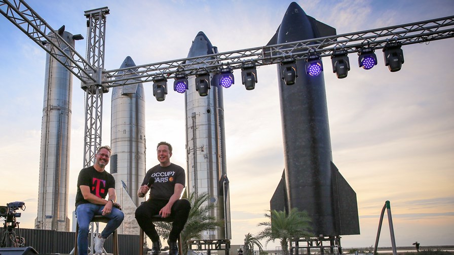 T-Mobile US CEO Mike Sievert (left) buddies up with SpaceX chief Elon Musk (right) at the Starbase facility in Texas. T-Mobile US CEO Mike Sievert (left) buddies up with SpaceX chief Elon Musk (right) at the Starbase facility in Texas.