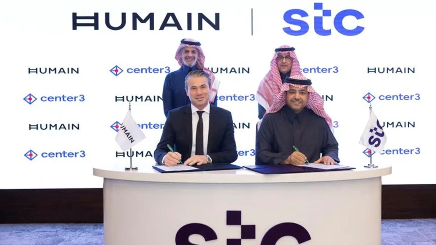Humain CEO Tareq Amin (front left) joins executives from STC and center3 to seal the joint venture agreement.